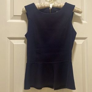 Peplum sleeveless top with zip back